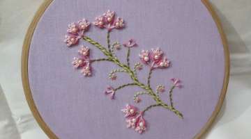 Hand embroidery of a flower twig with Double Buttonhole Stitch and Bullion Stitch